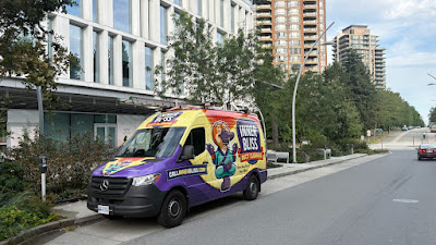 Branded Inner Bliss Sprinter van in an urban neighborhood